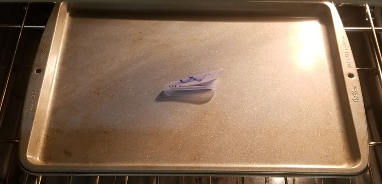Shrink plastic flattened back out and ready to remove